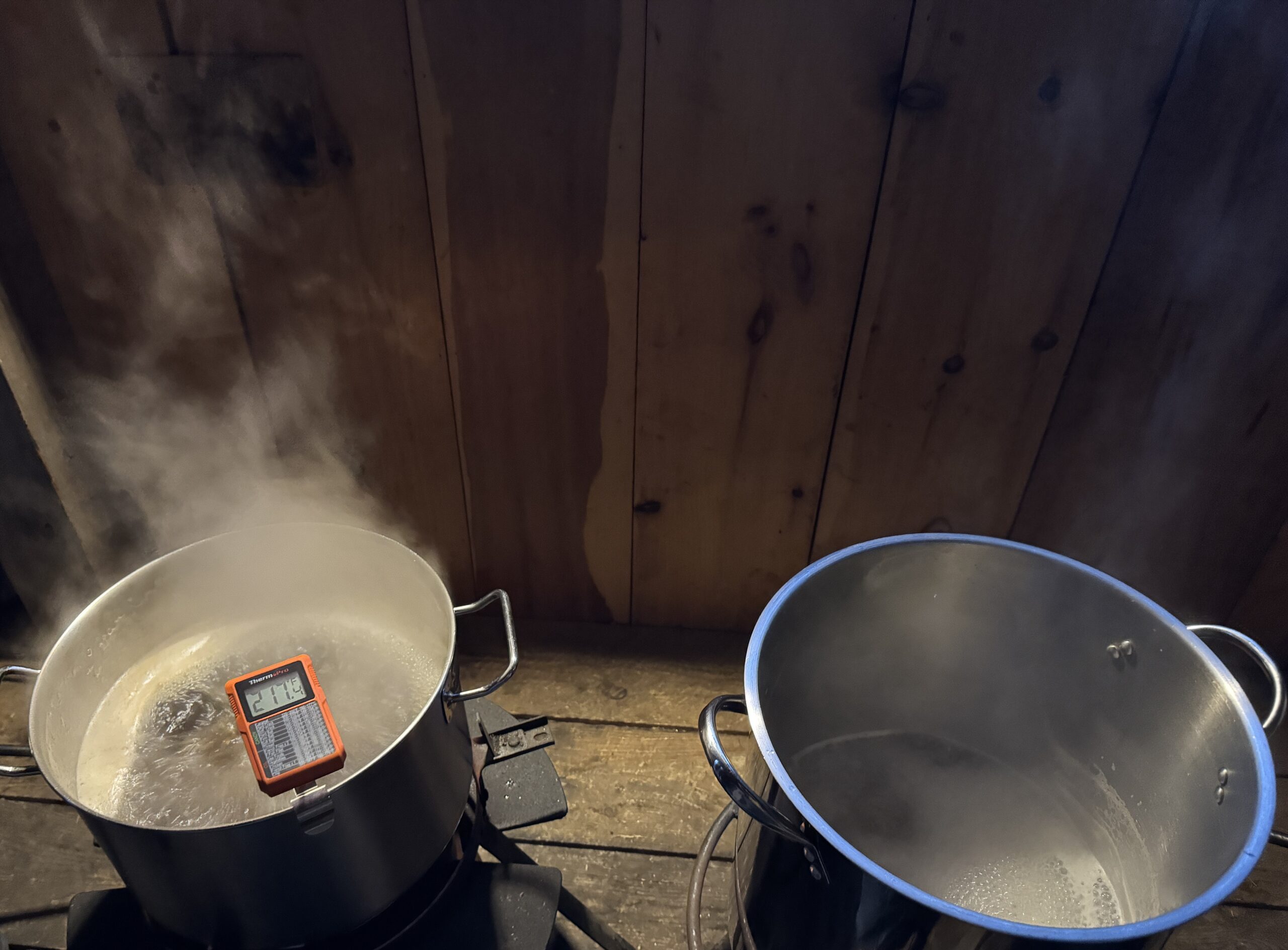 Two pots of boiling syrup